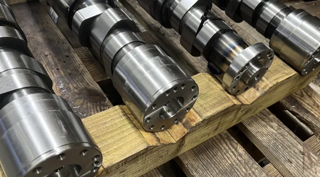 Camshafts on wooden beams